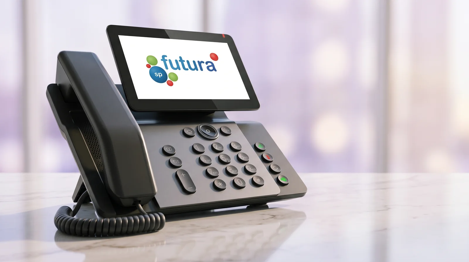 Teléfono IP Fanvil sobre una mesa de oficina, con el logotipo de Futura SP en su pantalla.